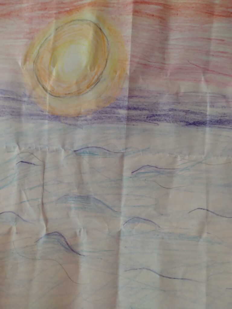 我が子の海辺の景色の絵
